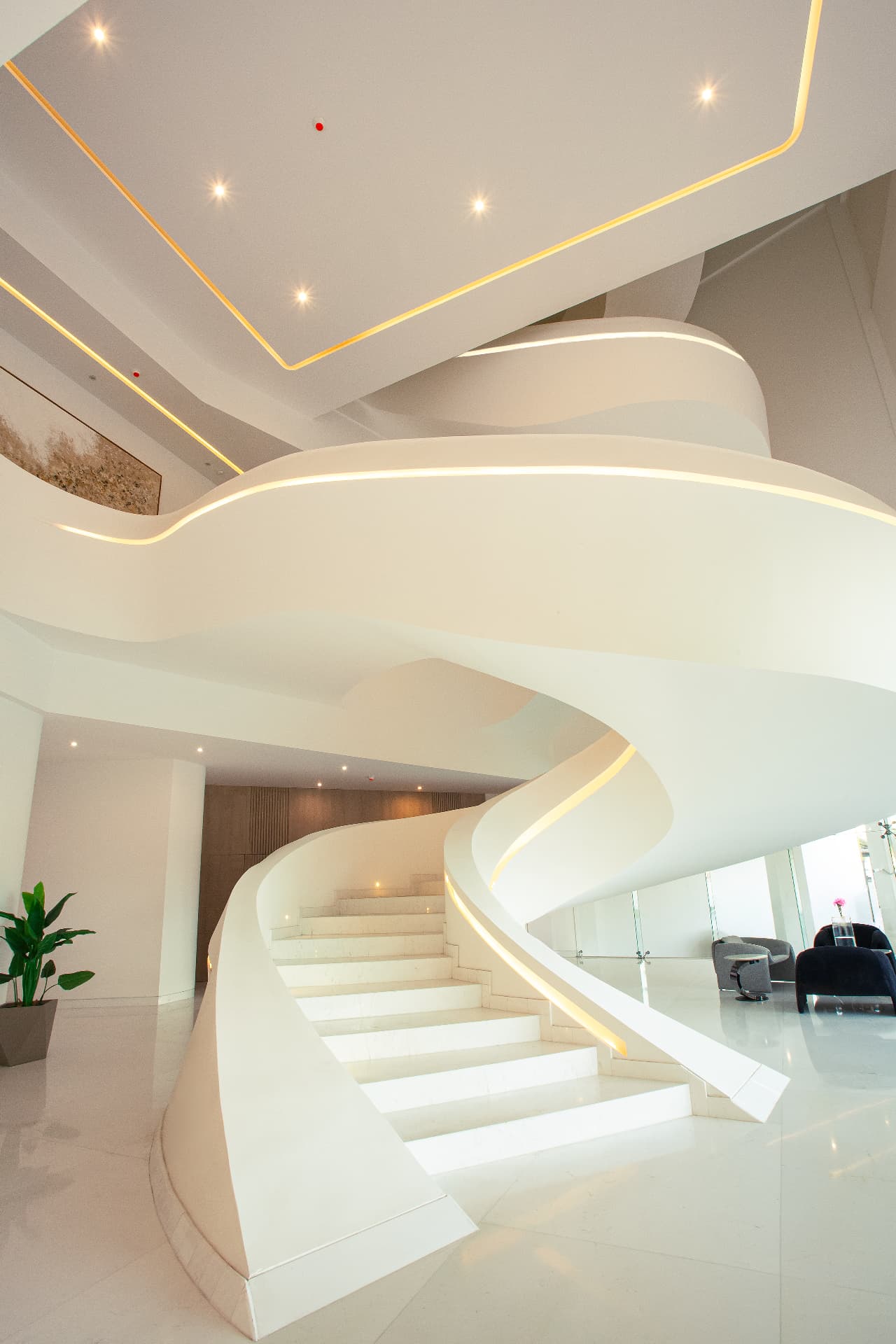 Verona Tower — sculptural white spiral staircase with integrated lighting