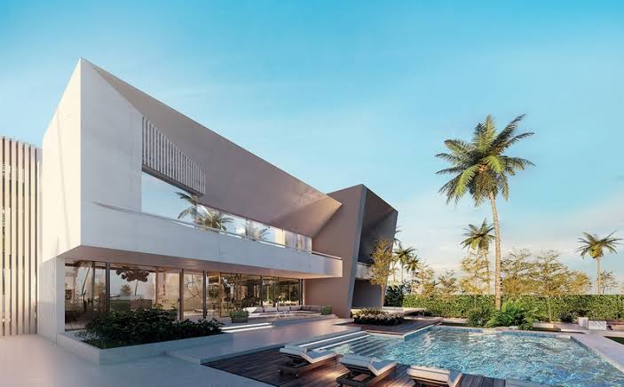 Show villa of Shams Ar Riyadh with white sculpted architecture, pool terrace and palm trees